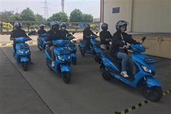 Why does ECGO EVmoto switch from battery-swapping to charging?