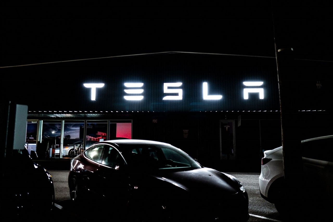 Tesla bets future on custom chips as profit plunges 64%